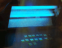 Curing epoxy using UV light box