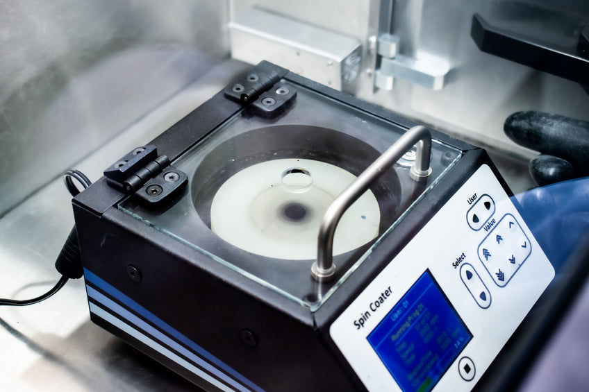 Perovskite being spin coated within Ossila Laboratory Glove Box